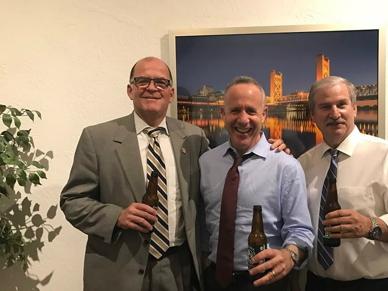 Sacramento Republic FC Managing Partner Warren Smith, Mayor Darrell Steinberg, and Minority Owner Kevin Nagle celebrate an end to a rift that appeared publicly as the city moved forward with a bid for a Major League Soccer Franchise