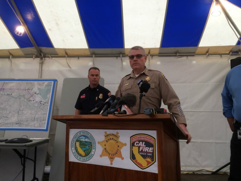 Butte County Sheriff Kory Honea takes questions from reporters in Oroville.