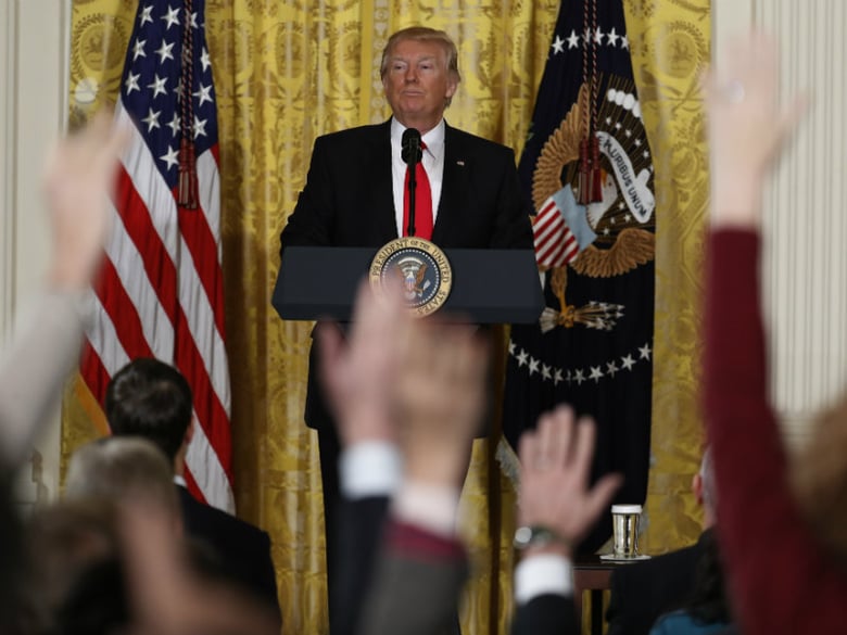 President Donald Trump looks at reporters during a news conference, Thursday, Feb. 16, 2017, in the East Room of the White House in Washington. 