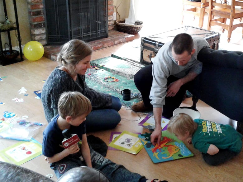 (Clockwise from left) Benaiah, Janae, Ben, and Salem Stoops prepare to welcome a foster child into their family. 