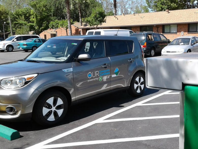 A Kia Soul Zipcar is one of eight electric vehicles available for residents of three Sacramento Public Housing complexes. The complexes and the Sacramento train depot are also receiving electric vehicle charging stations.