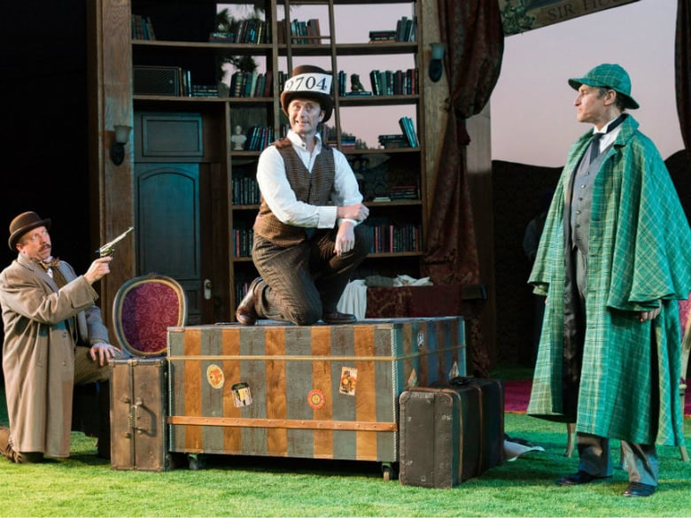 Watson (actor, Lynn Robert Berg, left), Cabbie (actor, Jeffrey C. Hawkins, center), and Holmes (actor, Dougfred Miller, right) in Lake Tahoe Shakespeare Festival’s production of The Hound of the Baskervilles .