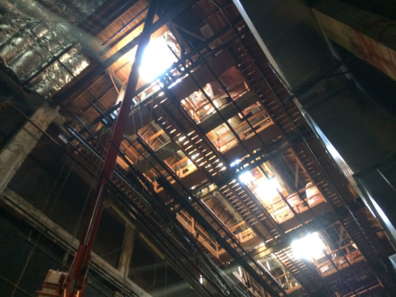Workers are still installing wiring in some rooms and air conditioning ducts in the McClatchy High School auditorium.
