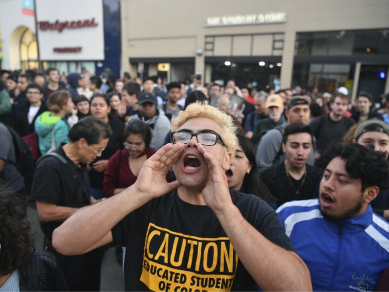 Victor Gonzales shouts with a crowd before a speaking engagement by Ben Shapiro on the campus of the University of California Berkeley in Berkeley, Calif., Thursday, Sept. 14, 2017.