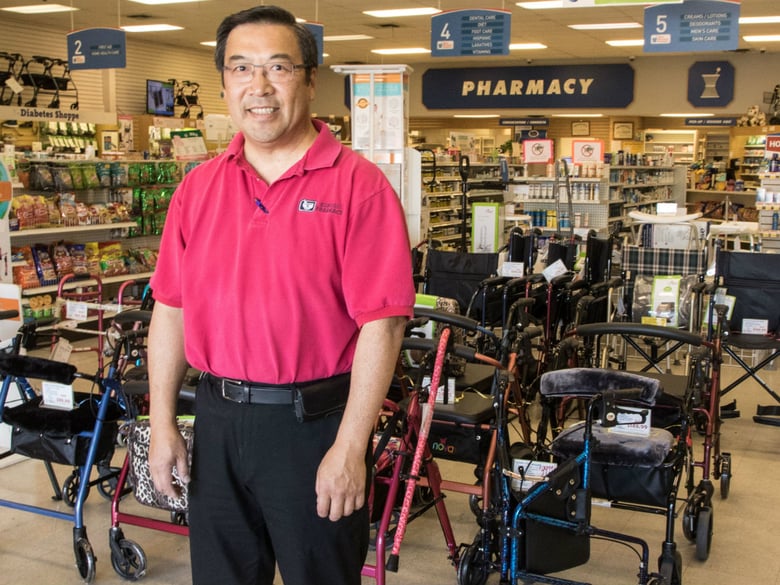 Brian Komoto, pharmacist and CEO of Komoto Healthcare, runs Komoto Pharmacy in downtown Delano.