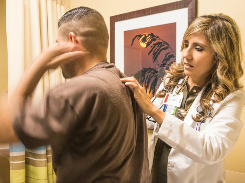 Dr. Olga Meave sees a patient complaining of shoulder pain. After graduating from medical school and practicing medicine in her hometown in northern Mexico, Meave is now a third-year resident at the Rio Bravo Family Residency program in Bakersfield.