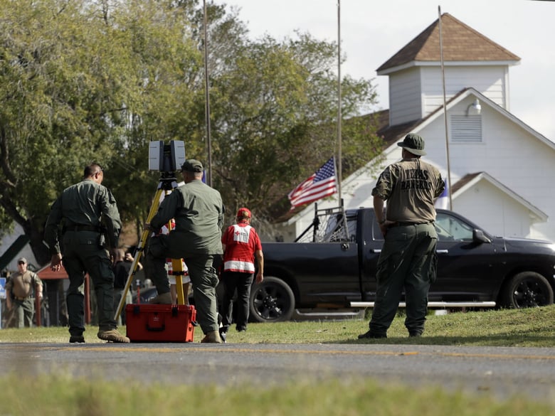 Flags fly at half-staff as law enforcement officials continue to investigate the scene of a shooting at the First Baptist Church of Sutherland Springs, Tuesday, Nov. 7, 2017, in Sutherland Springs, Texas. 