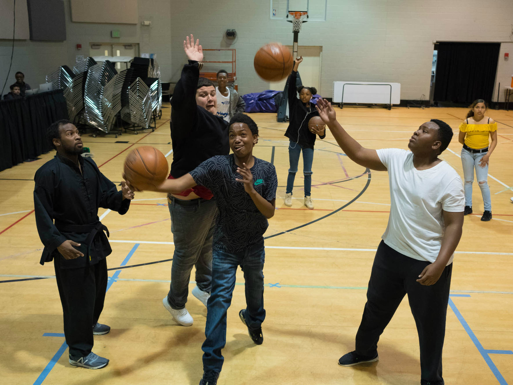 Teens play at the after school program at Liberty Towers Church in North Sacramento.