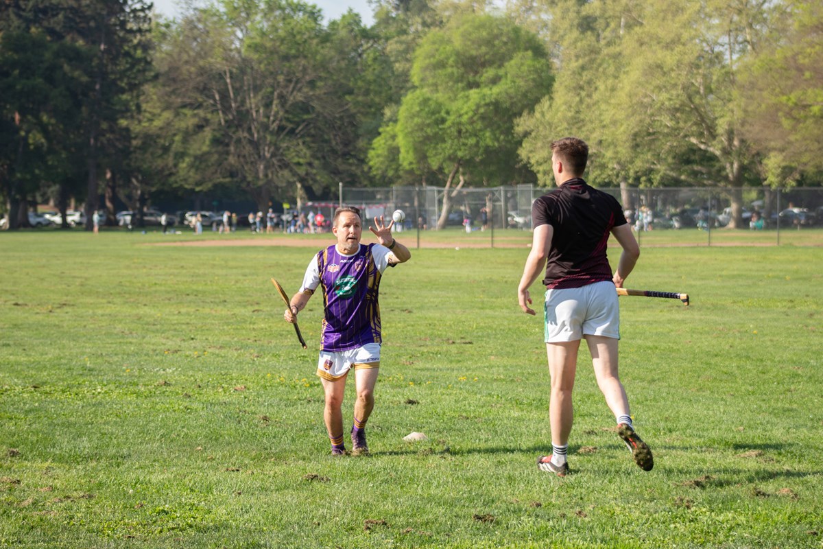 Marlin &Oacute; Ciarmhaic (left) catches a hand pass from David Neligan (right) during a Sacramento Kavanagh's practice Saturday, March 21, 2026, in Sacramento.