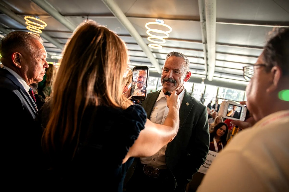 Amy Reichert, former candidate for the San Diego County Board of Supervisors, films gubernatorial candidate Chad Bianco at the California Republican Party convention in San Diego Resort on April 11, 2026.