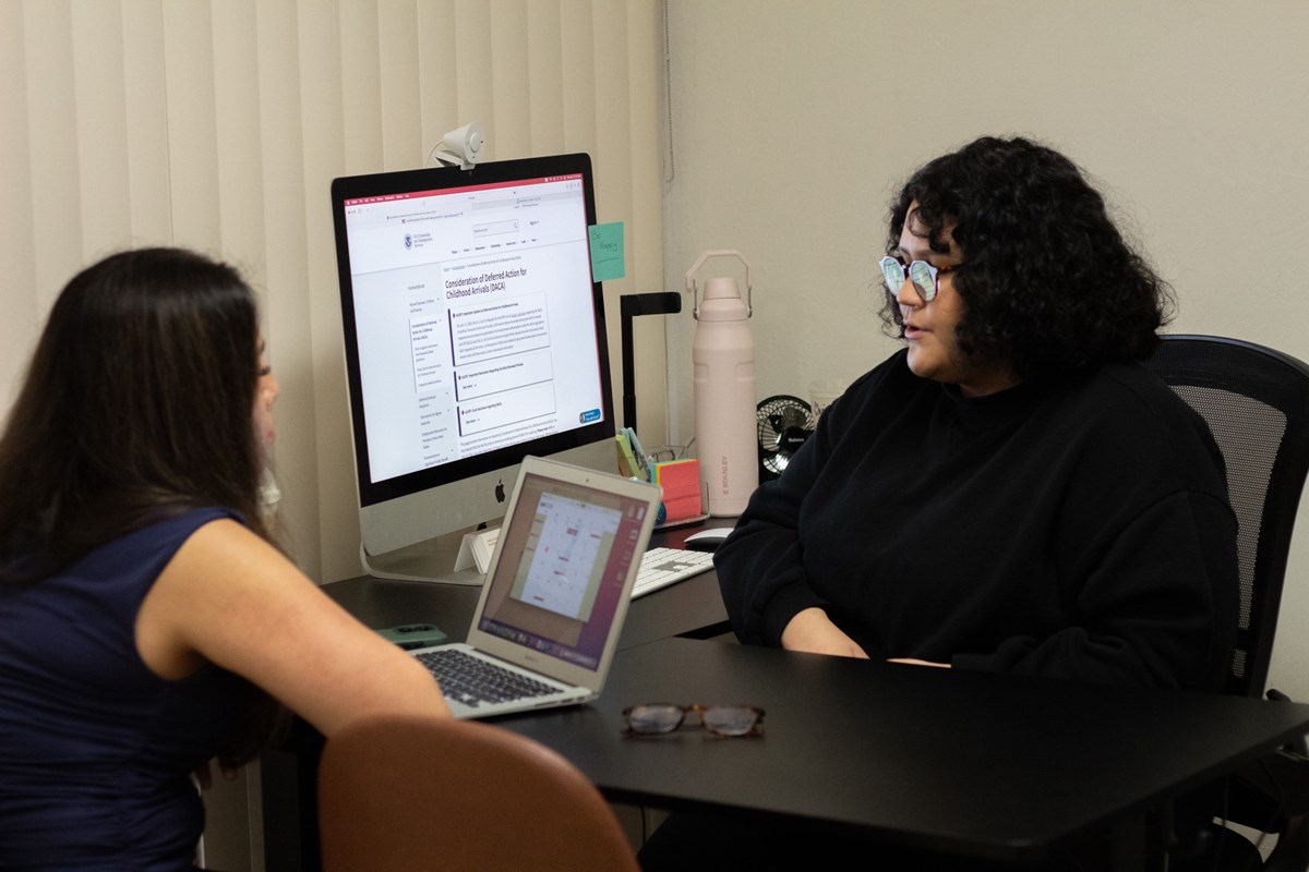 Giselle Garcia (right) discusses the case with Valladares Monday, April 13, 2026, at the NorCal Resist office in Sacramento.