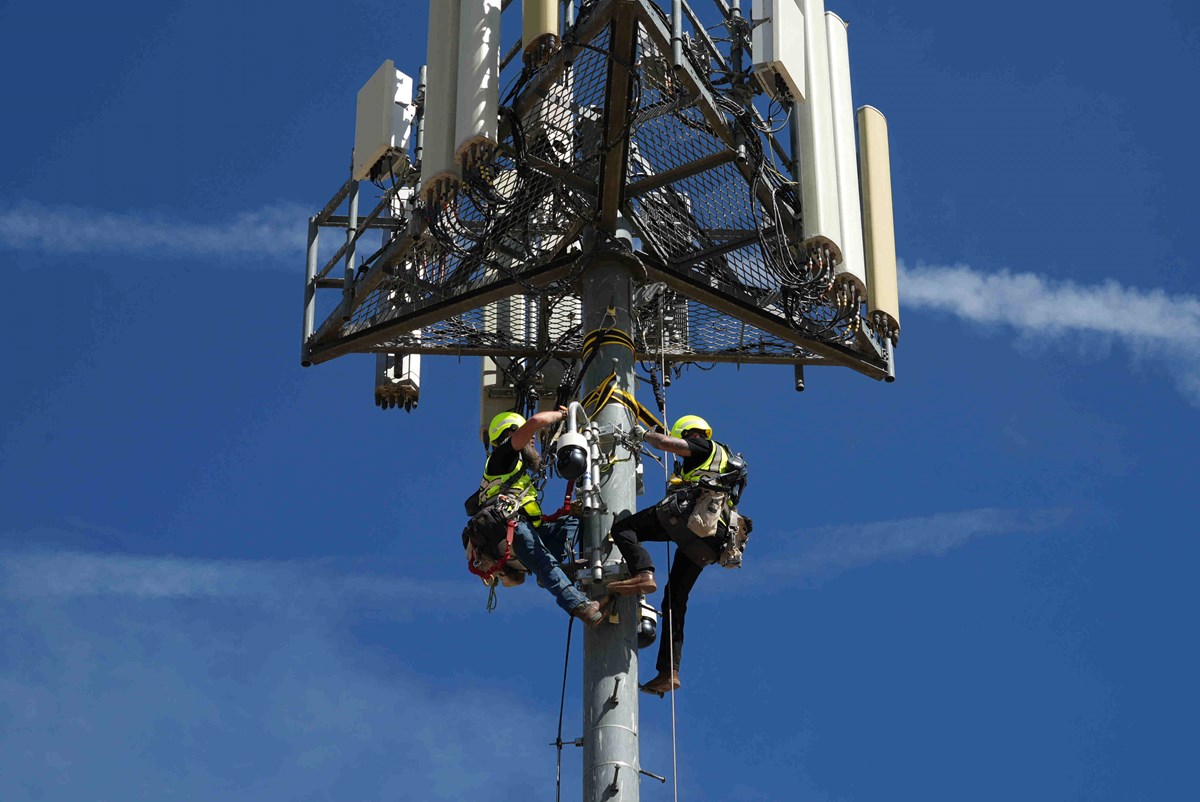 Contractors inspect Pano AI cameras used for detecting wildfires Monday, April 20, 2026, in Aurora, Colo.