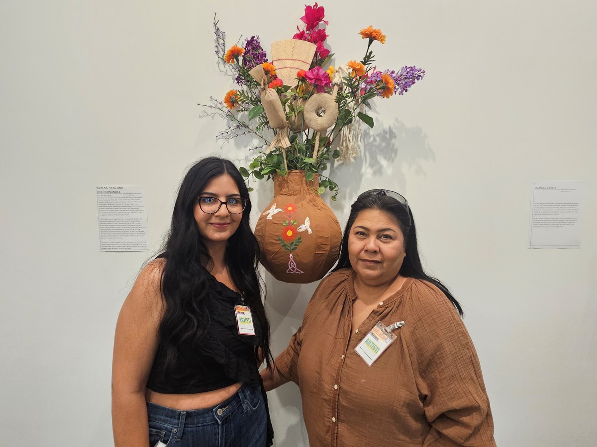 Iris Hernandez (left) and her mother Lorena Raya (right) run a custom pi&ntilde;ata business. Their design reflects Hernandez and Raya&rsquo;s shared journey, from coming to the U.S. and working different jobs, to their bond as mothers and women.
