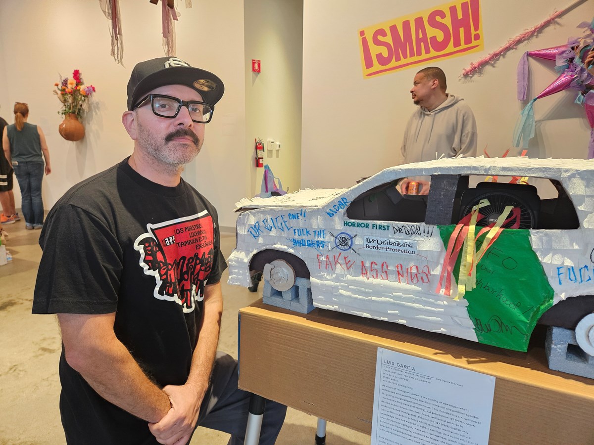 Luis Garcia said his pi&ntilde;ata captures street aesthetics and is meant to be a symbol of resistance against federal crackdowns targeting Latino and immigrant communities. His pi&ntilde;ata will not be smashed at the end of the exhibit.