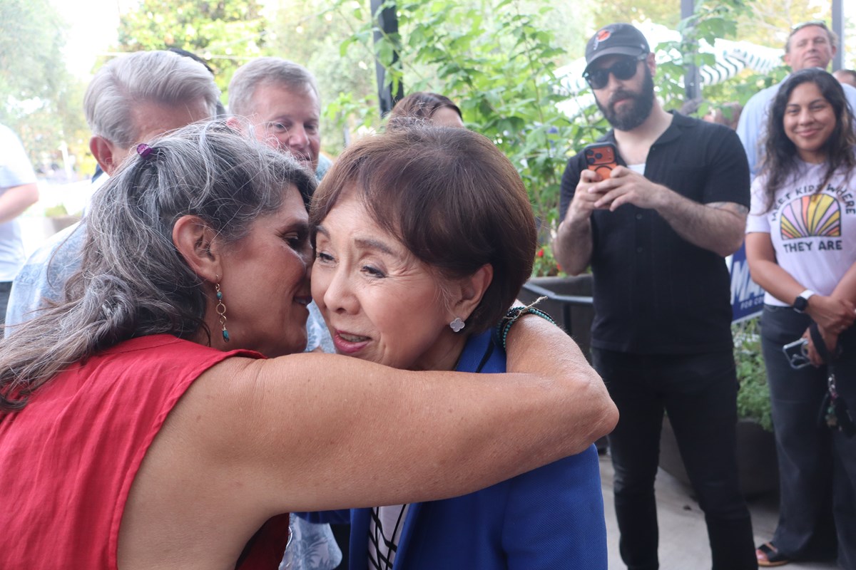 Doris Matsui greets supporters at an election watch party.