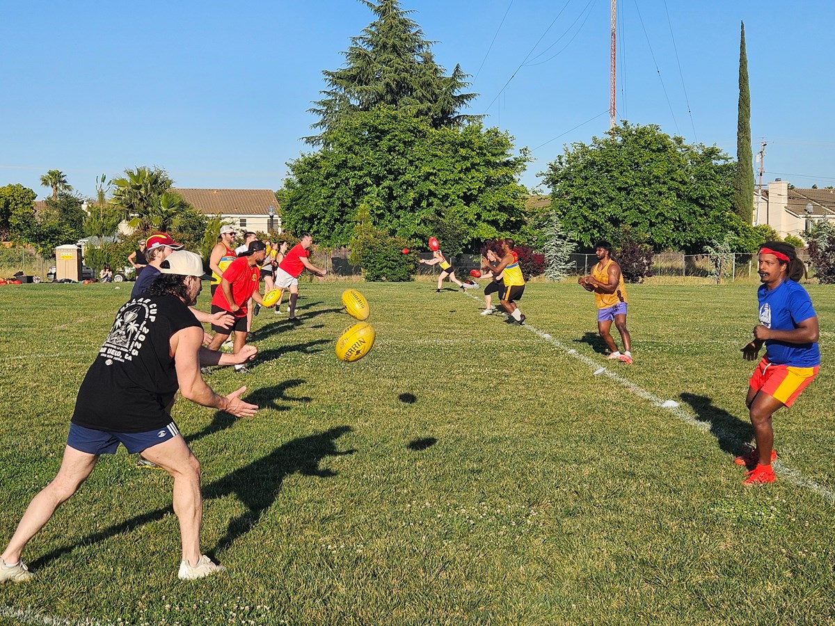 Matt &ldquo;Freddy&rdquo; Frederickson (left), Julian &ldquo;Peacock&rdquo; David (right) and other Sacramento Suns players practice their handballs on Wednesday, April 29, 2026 at Airfield Park in Natomas.