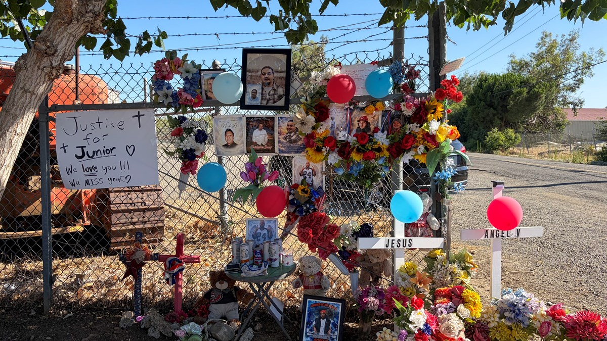 A makeshift memorial to the seven men killed in a fireworks warehouse explosion stands in the Dollar General lot on Wednesday, July 1, 2026, in Esparto, Calif. Friends and family members gathered nearby for a vigil marking one year since the blast.