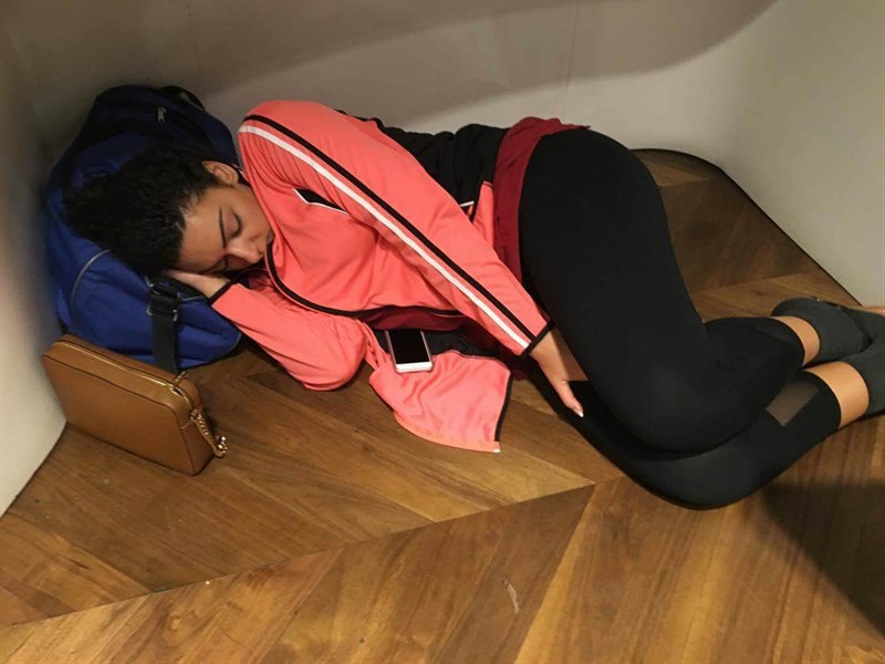 Joanne sleeping at airport.jpg